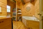 Main Level Master Bathroom with Jacuzzi and Shower